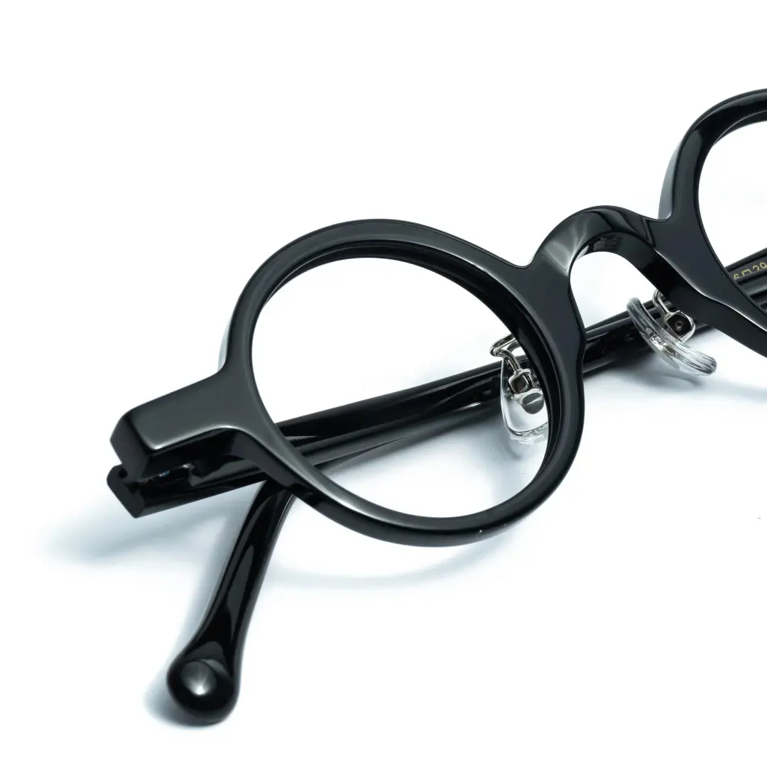 Frame detail view of Lala vintage round acetate eyeglasses in black. SPU: RA0012306