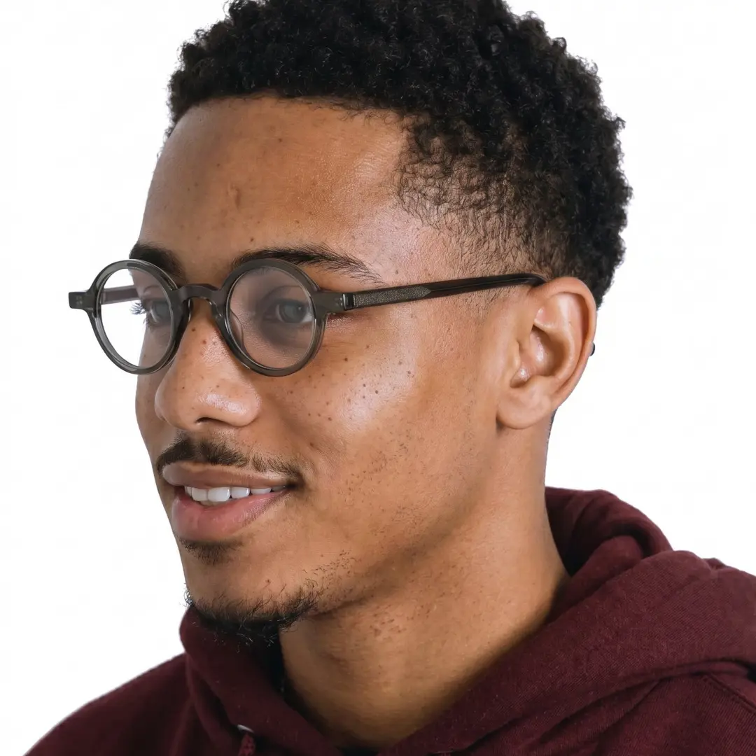 Male wearing vintage grey round acetate eyeglasses, natural smile. SPU: RA0012306
