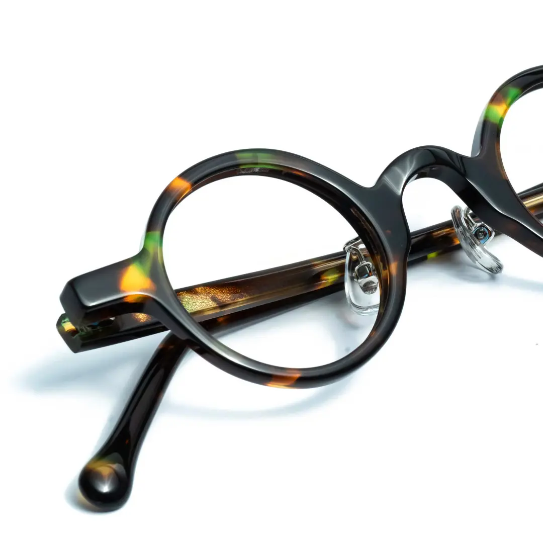 Frame detail view of Lala vintage round acetate eyeglasses in tortoise. SPU: RA0012306