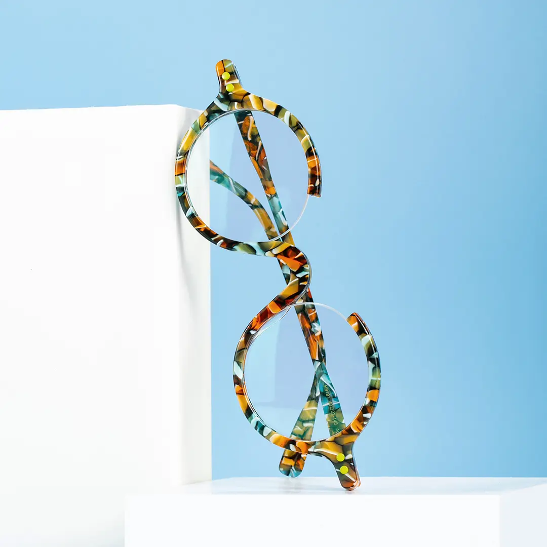 Scene close-up view of Paola round acetate eyeglasses RA0022212 in multicolor