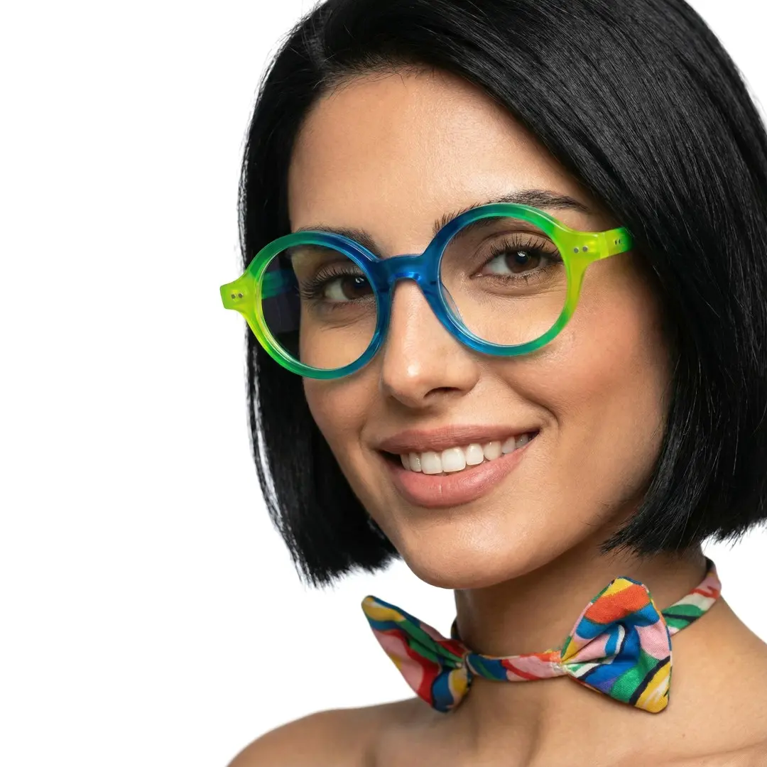 Three-quarter view of female wearing colorful blue round eyeglasses, natural smile, RA0022307