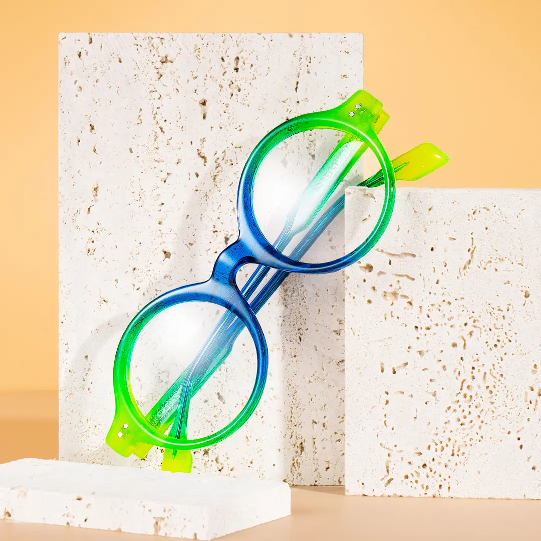 Scene close-up view of Luv colorful round acetate eyeglasses in blue. SPU: RA0022307