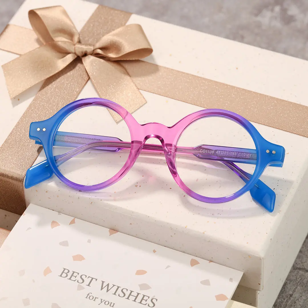 Scene close-up view of Luv colorful round acetate eyeglasses in pink. SPU: RA0022307