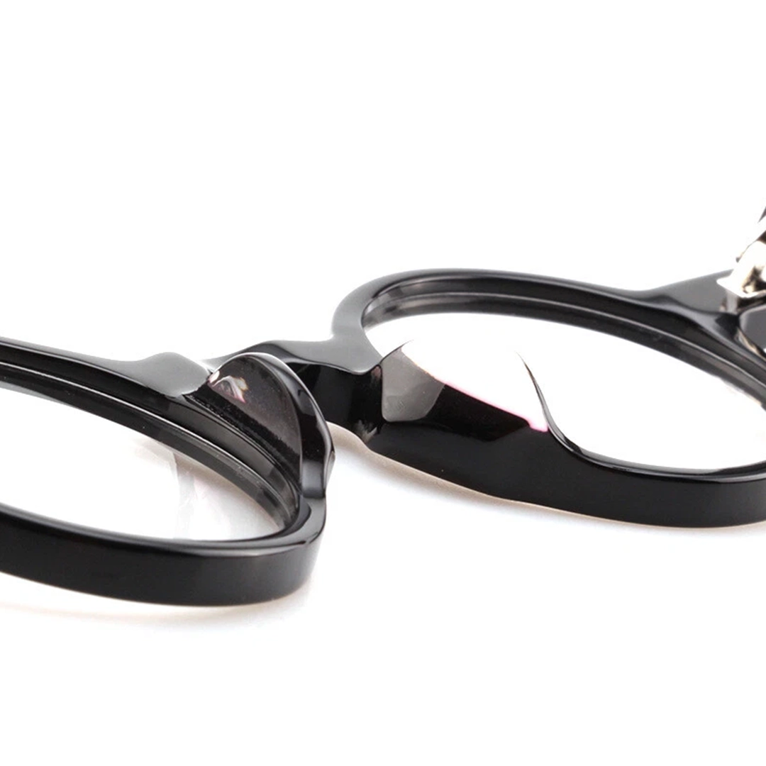 Integrated nose pad detail of Eirene round acetate eyeglasses RA0042301 in black