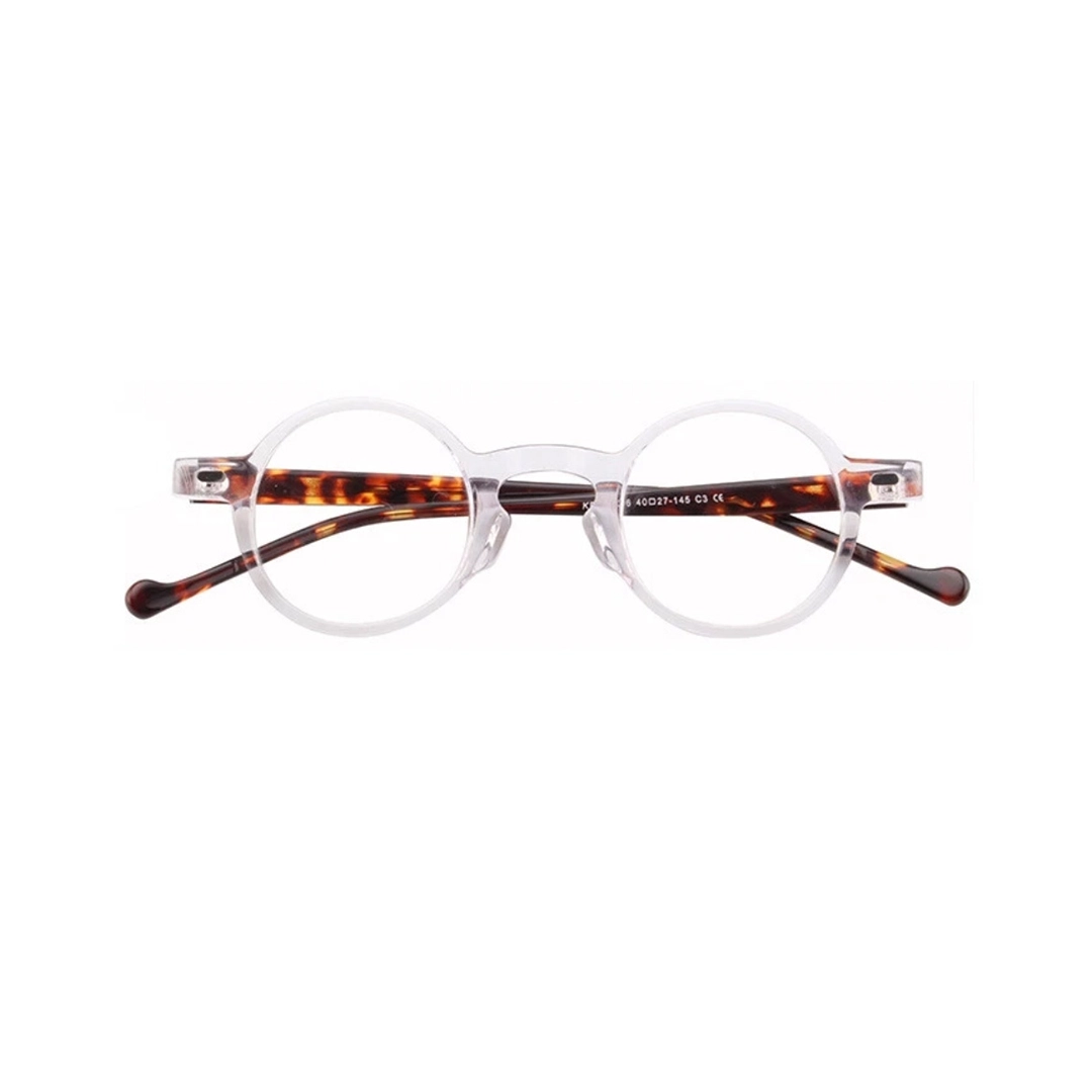 Front folded view of Eirene round acetate eyeglasses RA0042301 in clear