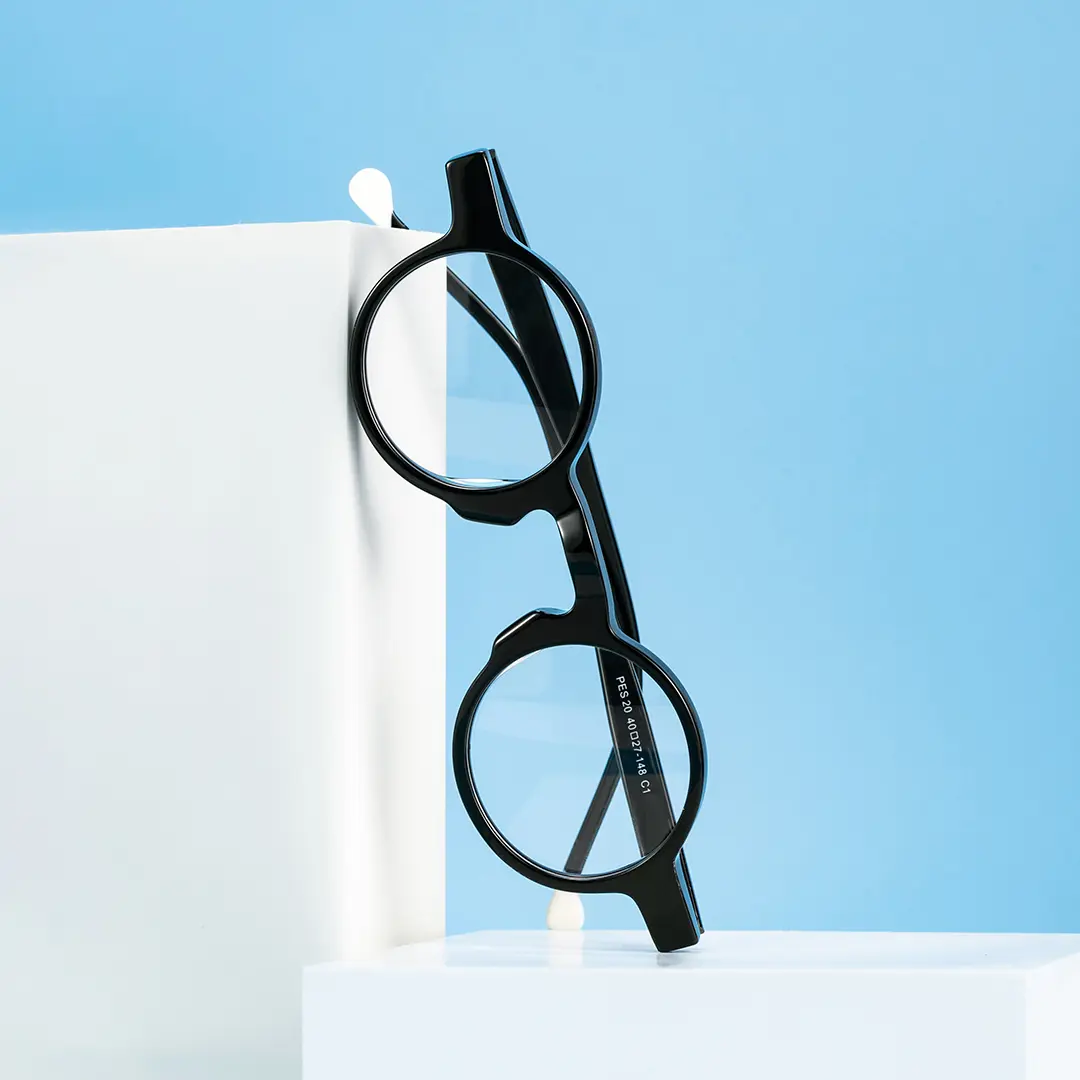 Scene close-up view of Maat vintage round acetate eyeglasses in black. SPU: RA0042303