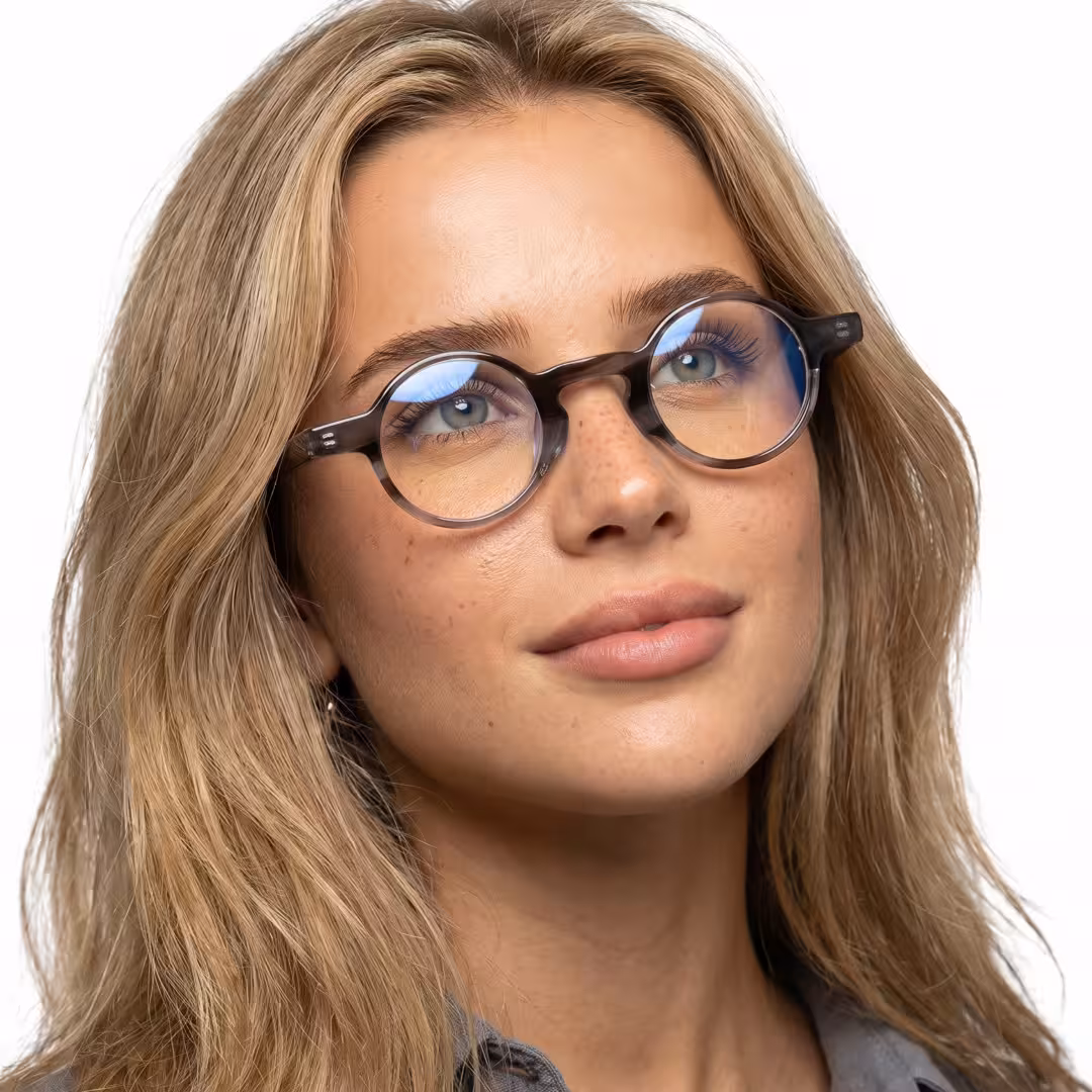 Female wearing vintage silver round acetate eyeglasses, natural smile. SPU: RA0042303