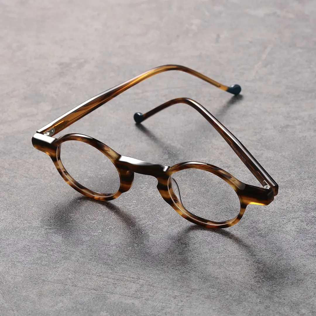 Scene view of Maat round acetate eyeglasses RA0042303 in yellow tortoise