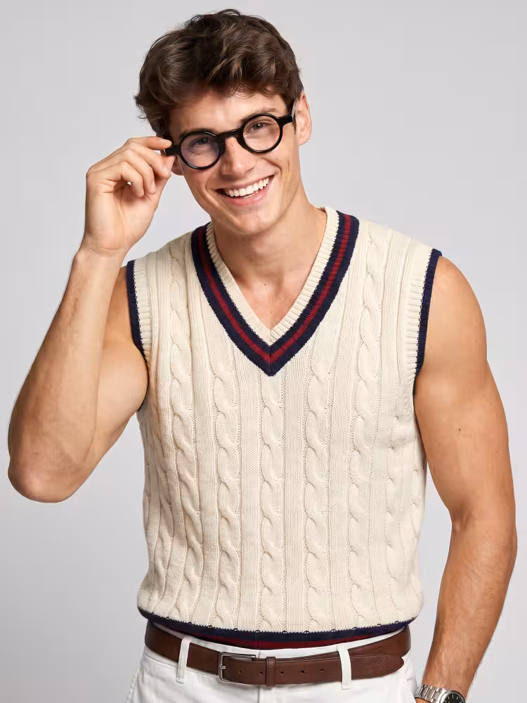 Male model wearing vintage black round acetate eyeglasses in a clean studio setting. SPU: RA0042303