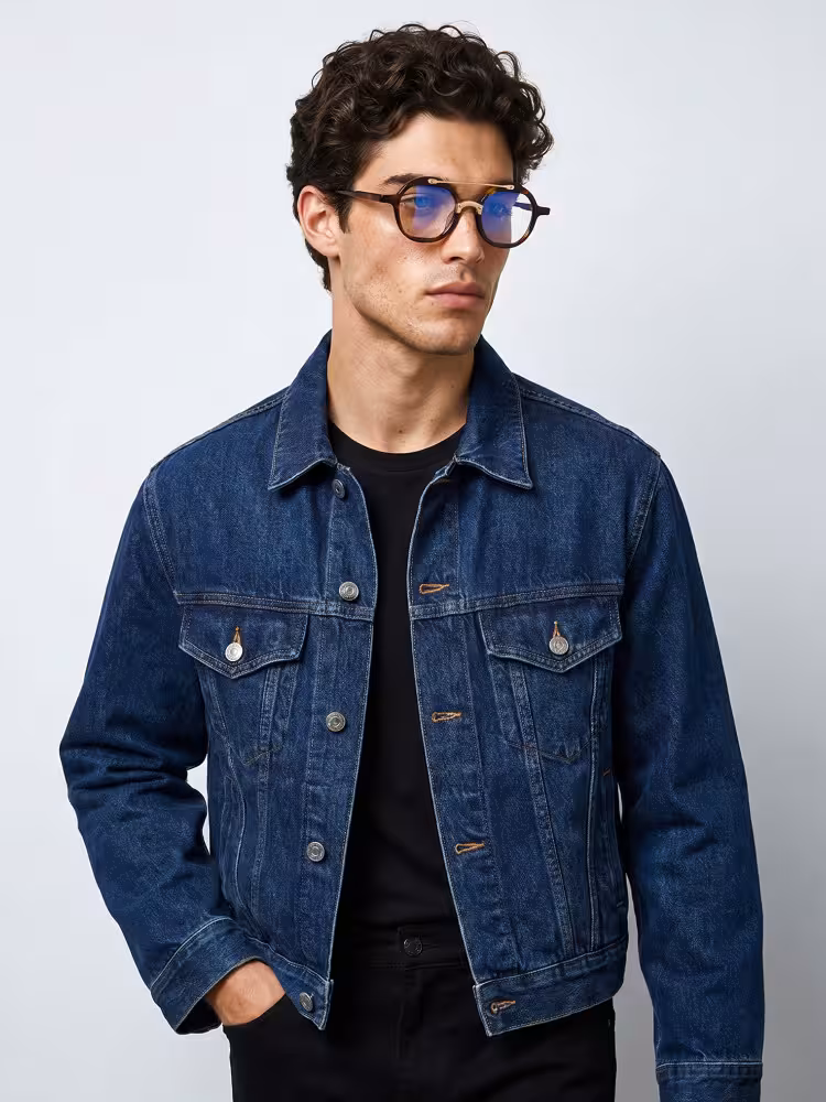 Male model wearing cool vintage tortoise round acetate eyeglasses in a studio setting. SPU: RA0052308