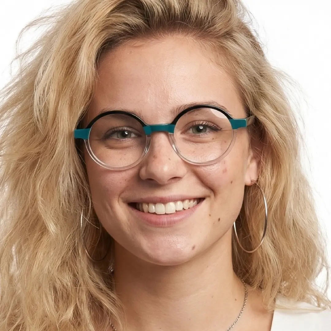 Front view of female wearing two-tone round eyeglasses, natural smile, RA0112309