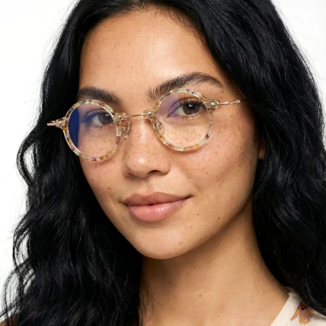 Three-quarter view of female wearing steampunk clearmulticolor round eyeglasses, natural expression, RA0142402