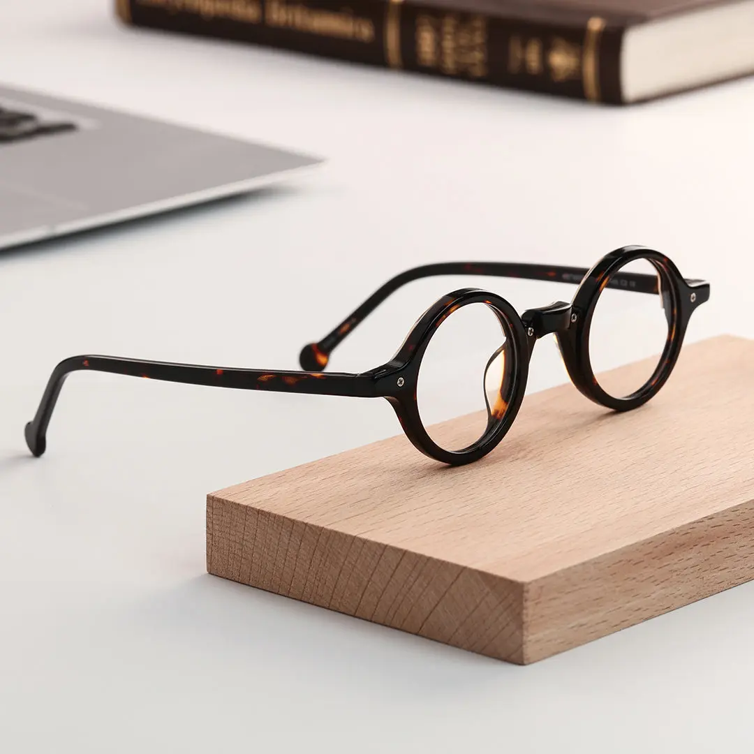 Scene view of Tartan vintage round acetate eyeglasses in tortoise. SPU: RA0182302