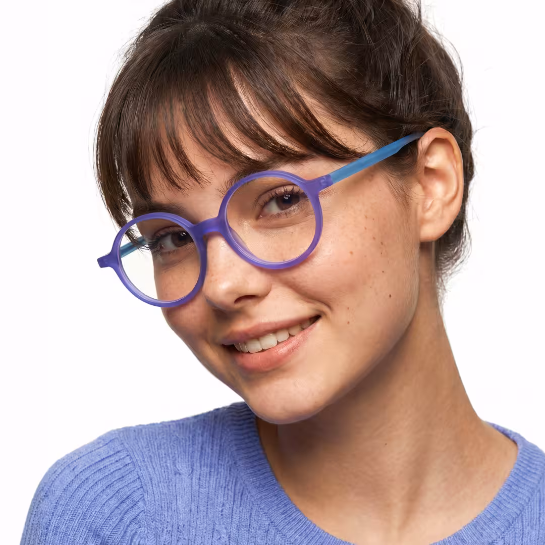 Female wearing colorful purple round acetate eyeglasses, smiling while looking at camera. SPU: RA0222310
