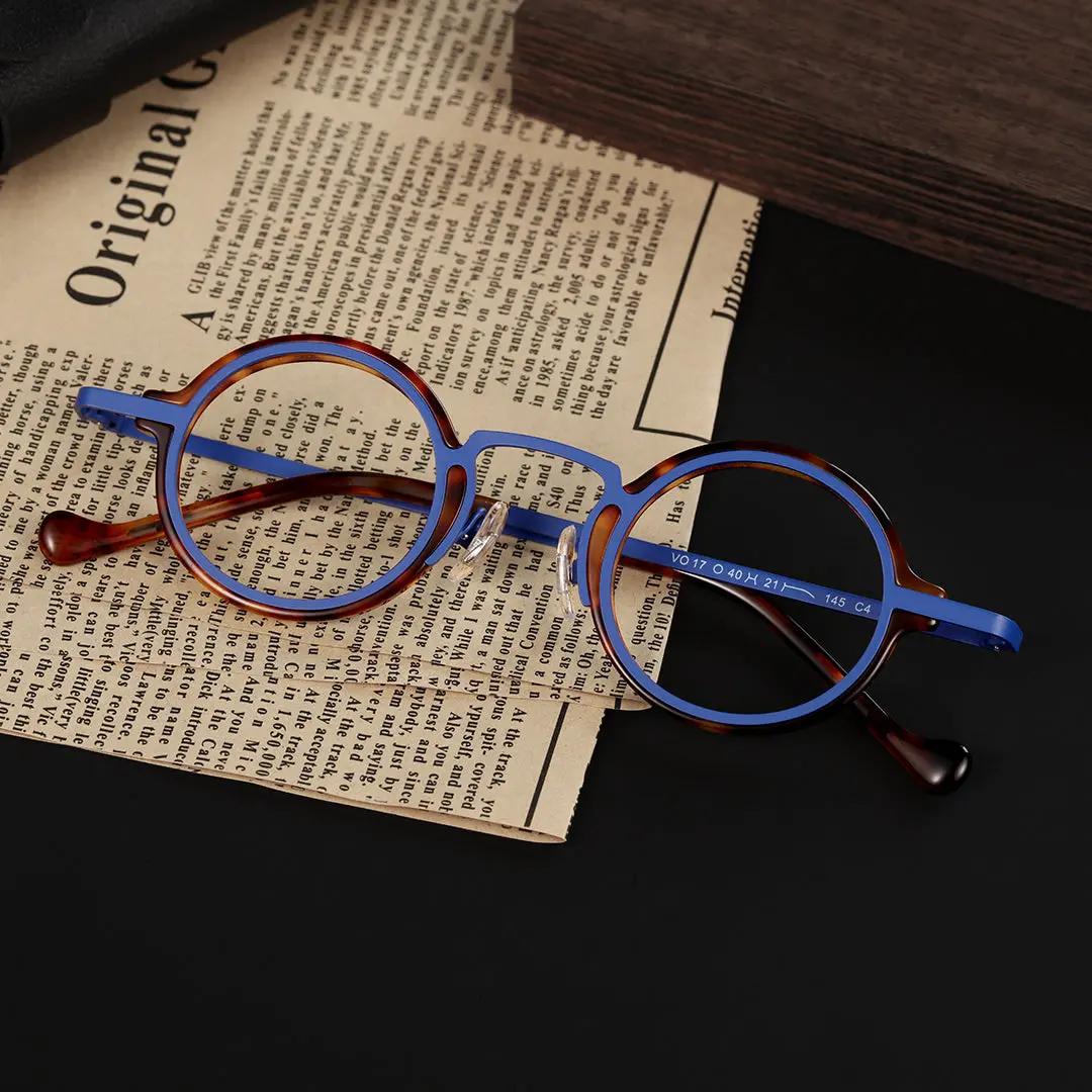 Scene close-up view of Kyire vintage round acetate eyeglasses in blue tortoise. SPU: RA0302402
