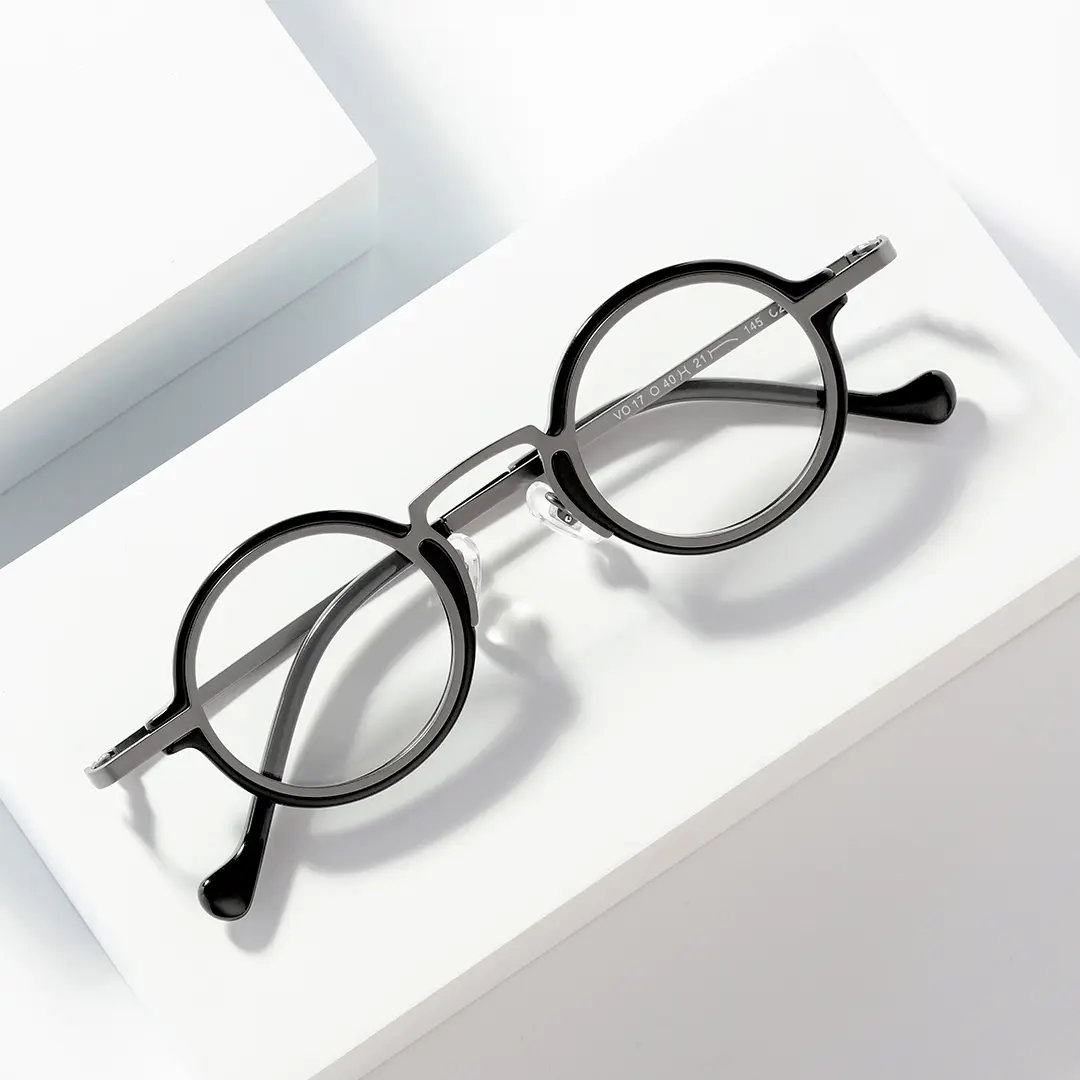 Scene close-up view of Kyire vintage round acetate eyeglasses in silver. SPU: RA0302402