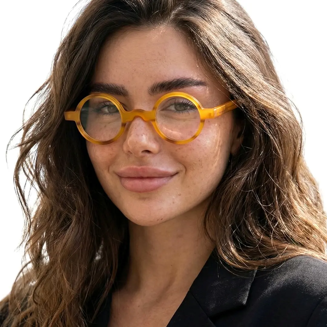 Front view of female wearing vintage orange round eyeglasses, natural smile, RA0332507
