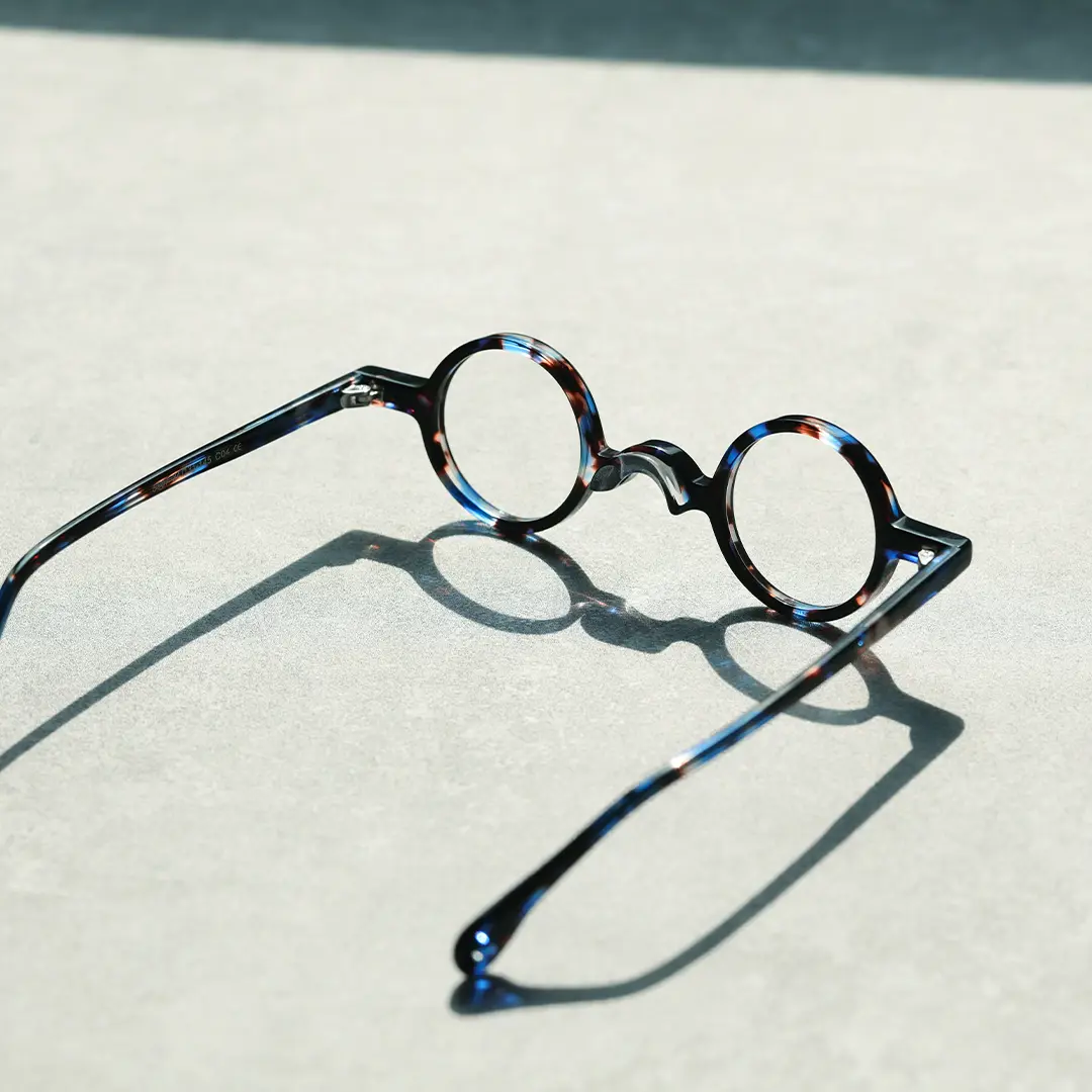 Scene view of Waye vintage round acetate eyeglasses in blue tortoise. SPU: RA0402411