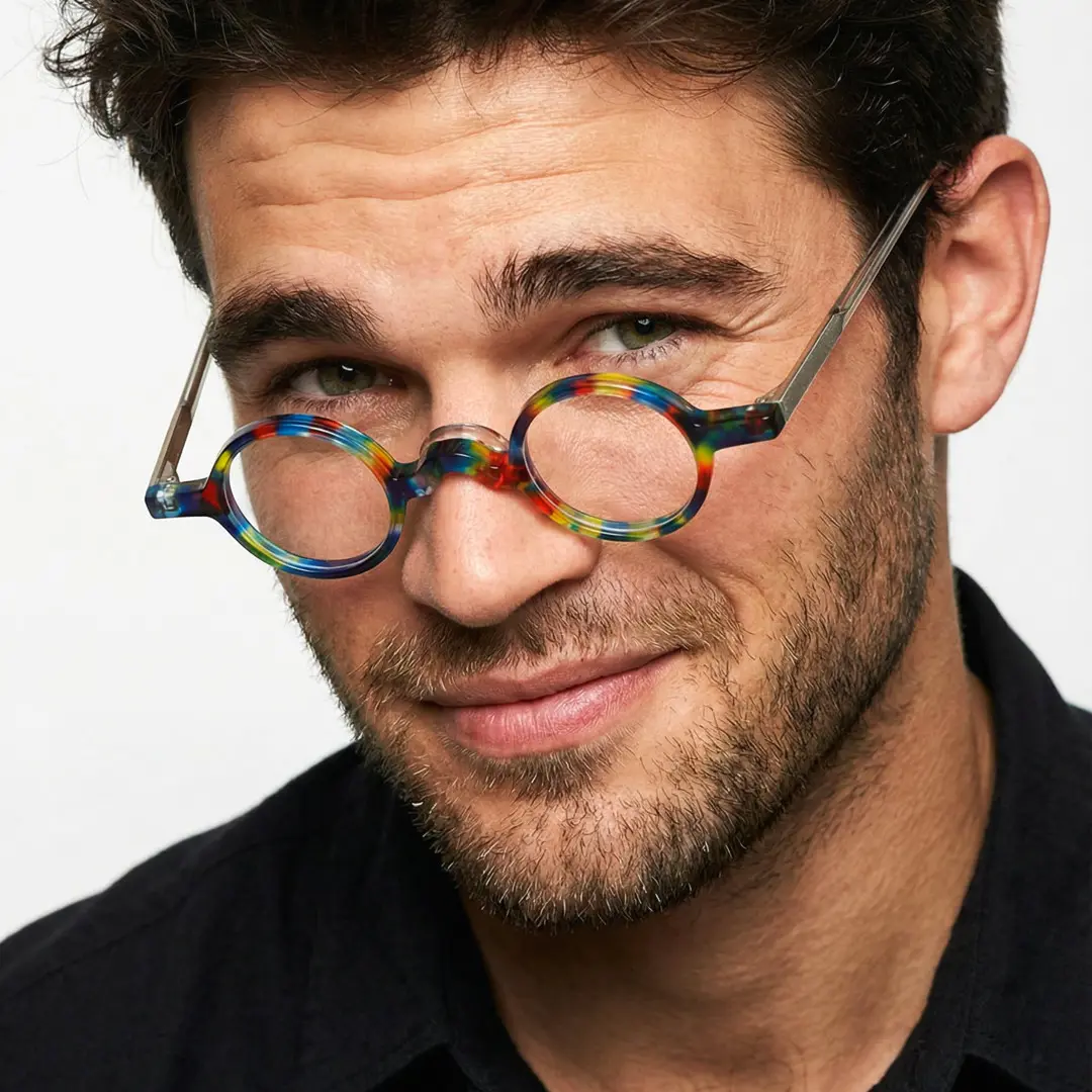 Slightly angled view of male wearing vintage multicolor round eyeglasses, various expressions, RA0402411