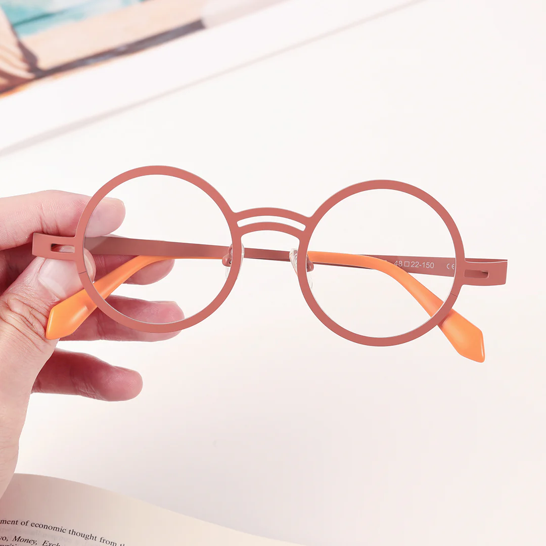 Scene view of Carnelian round metal eyeglasses RM0052406 in pink