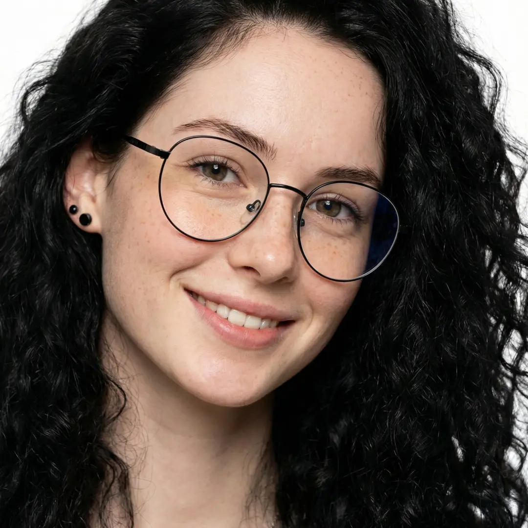 Face close-up view of female wearing black round eyeglasses, natural expression, RM0082209