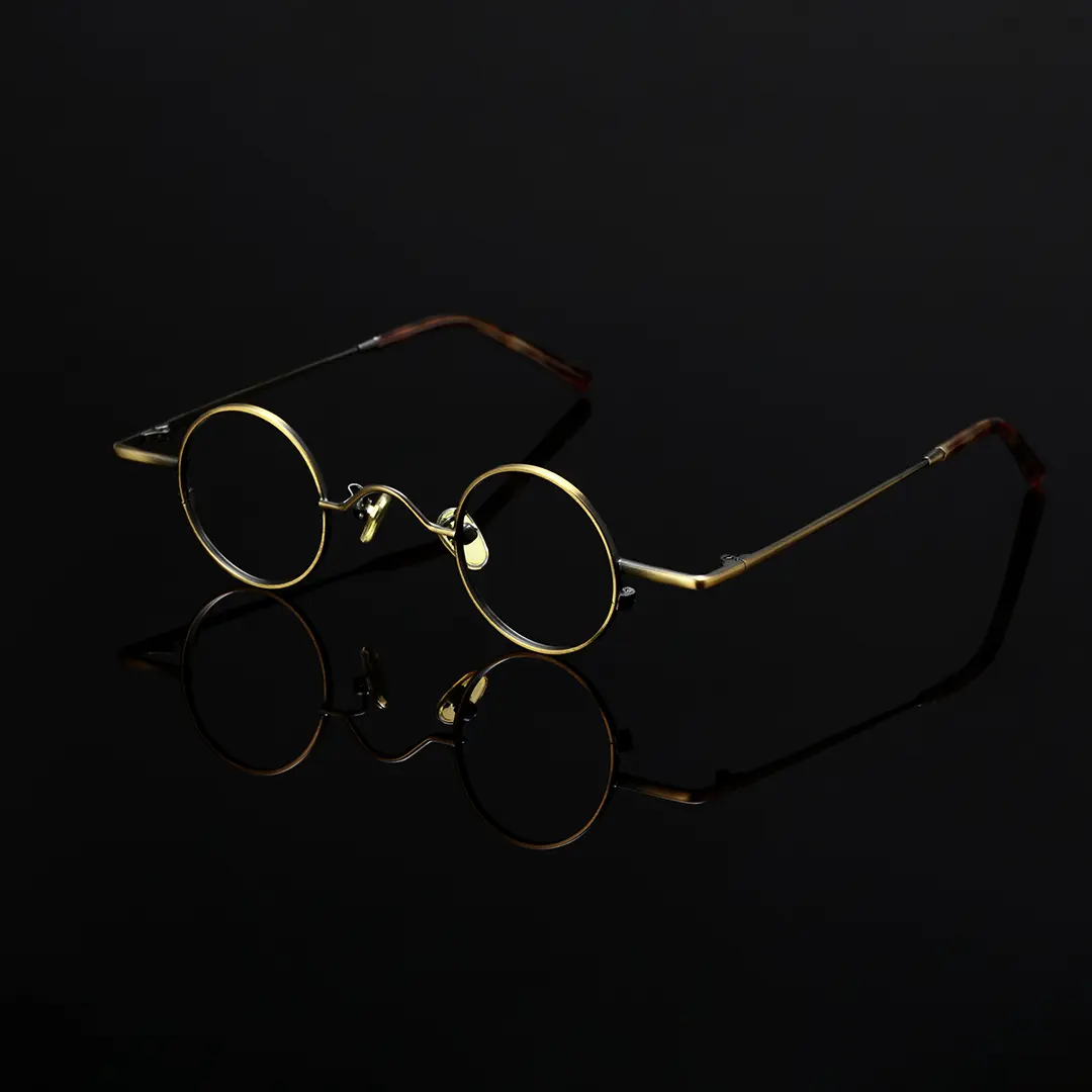 Scene view of Yezy john lennon round metal eyeglasses RM0082308 in bronze