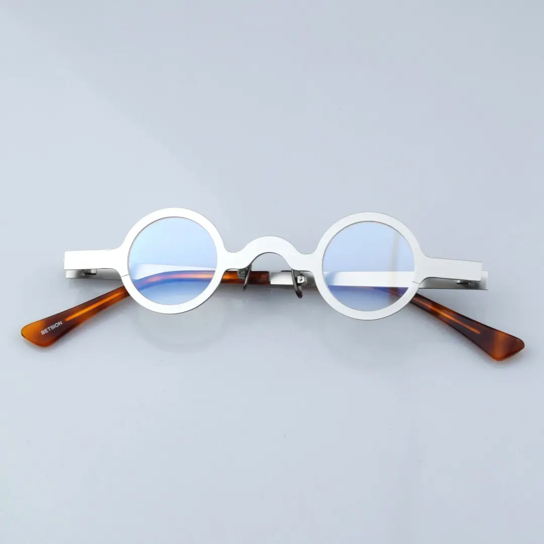 Front folded view of Crew round metal eyeglasses RM0122404 in silver