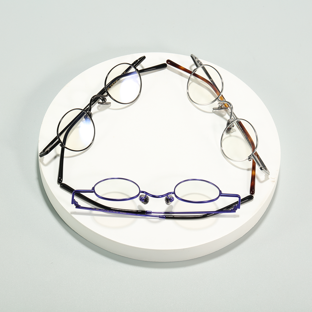 Scene view of Cory john lennon round metal eyeglasses RM0202601 in black