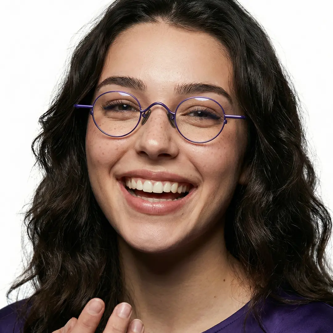 Front view of female wearing purple round eyeglasses, big smile, RM0202601
