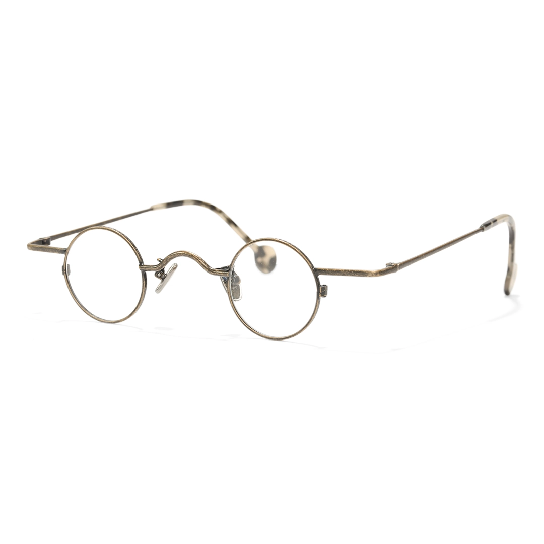 Angle view of Xen vintage round metal eyeglasses RM0242601 in bronze