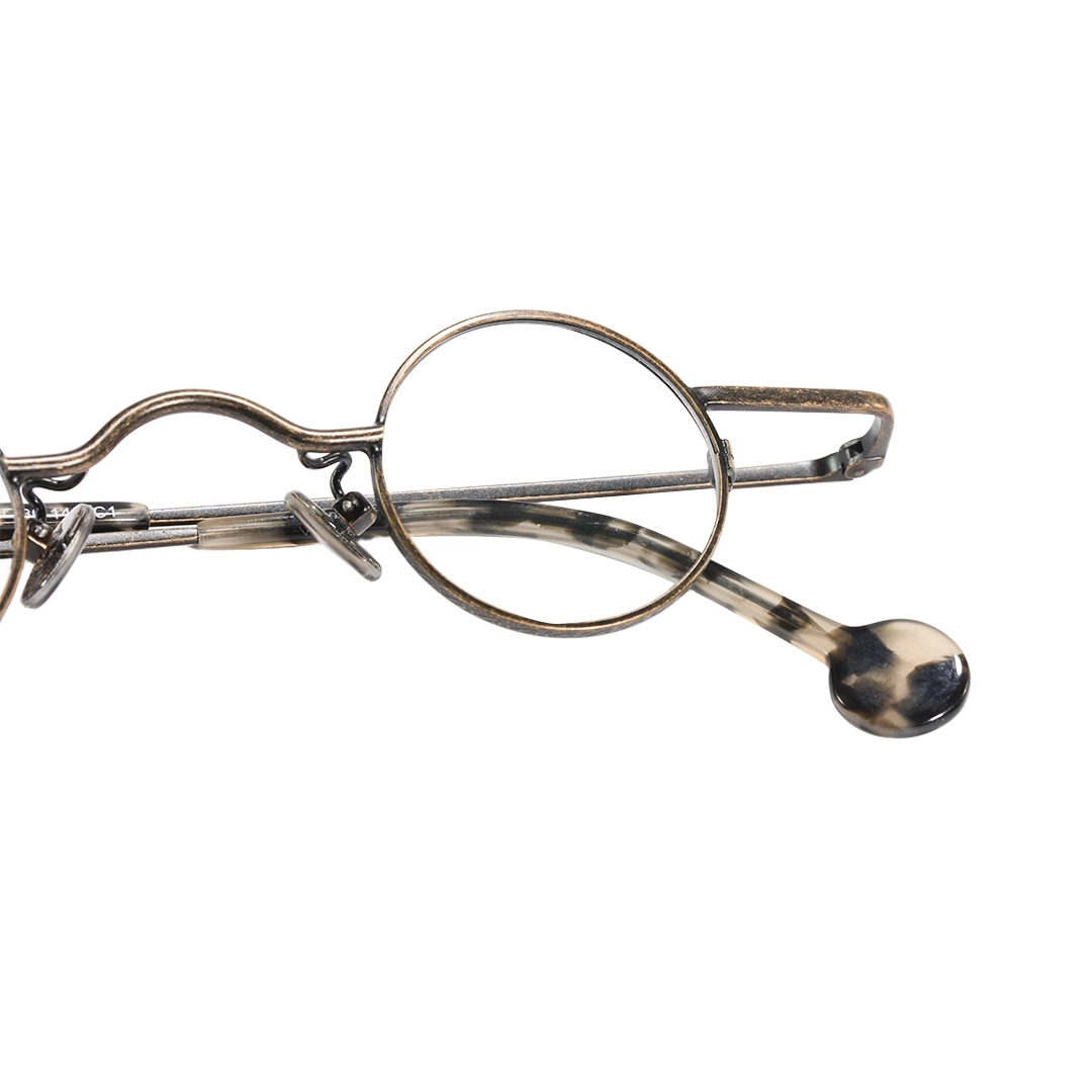 Frame detail view of Xen vintage round metal eyeglasses RM0242601 in bronze
