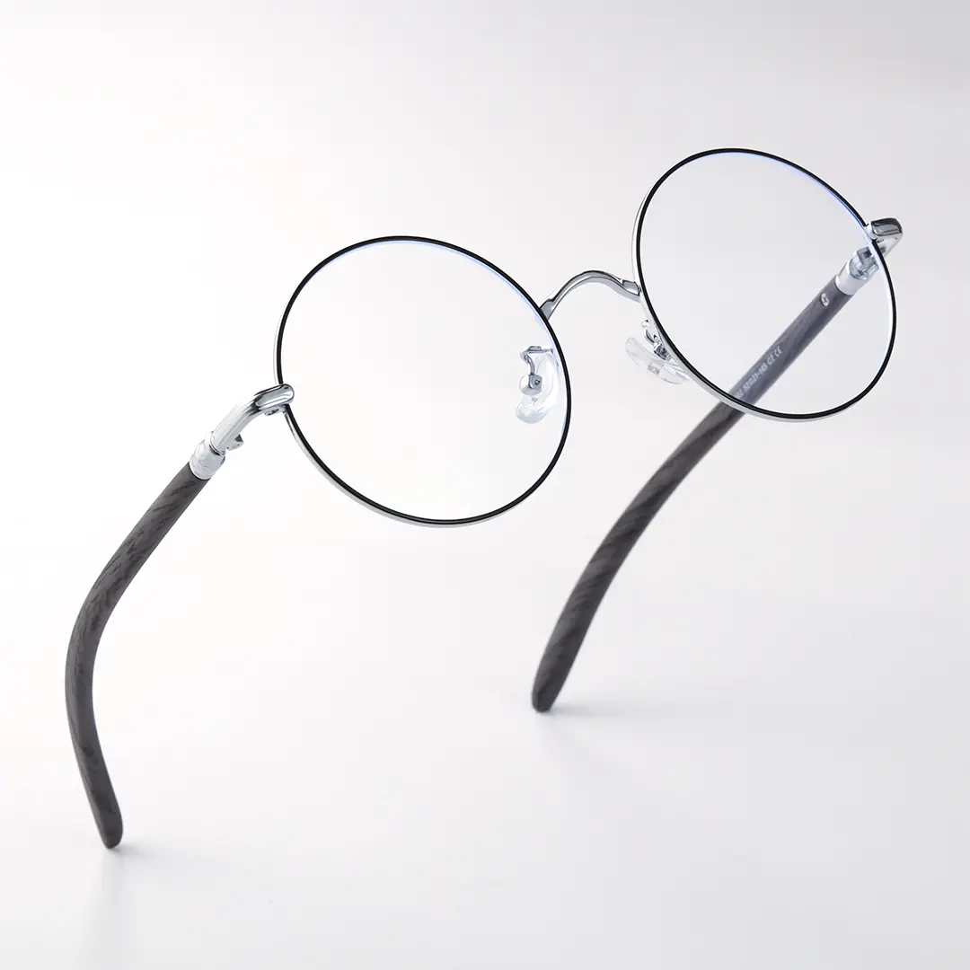 Scene close-up view of Sivigny vintage round metal eyeglasses RM0302407 in black