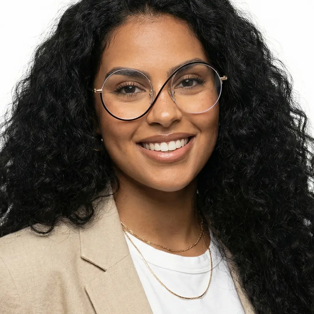 Front view of female wearing black round eyeglasses, smiling, RM0332412