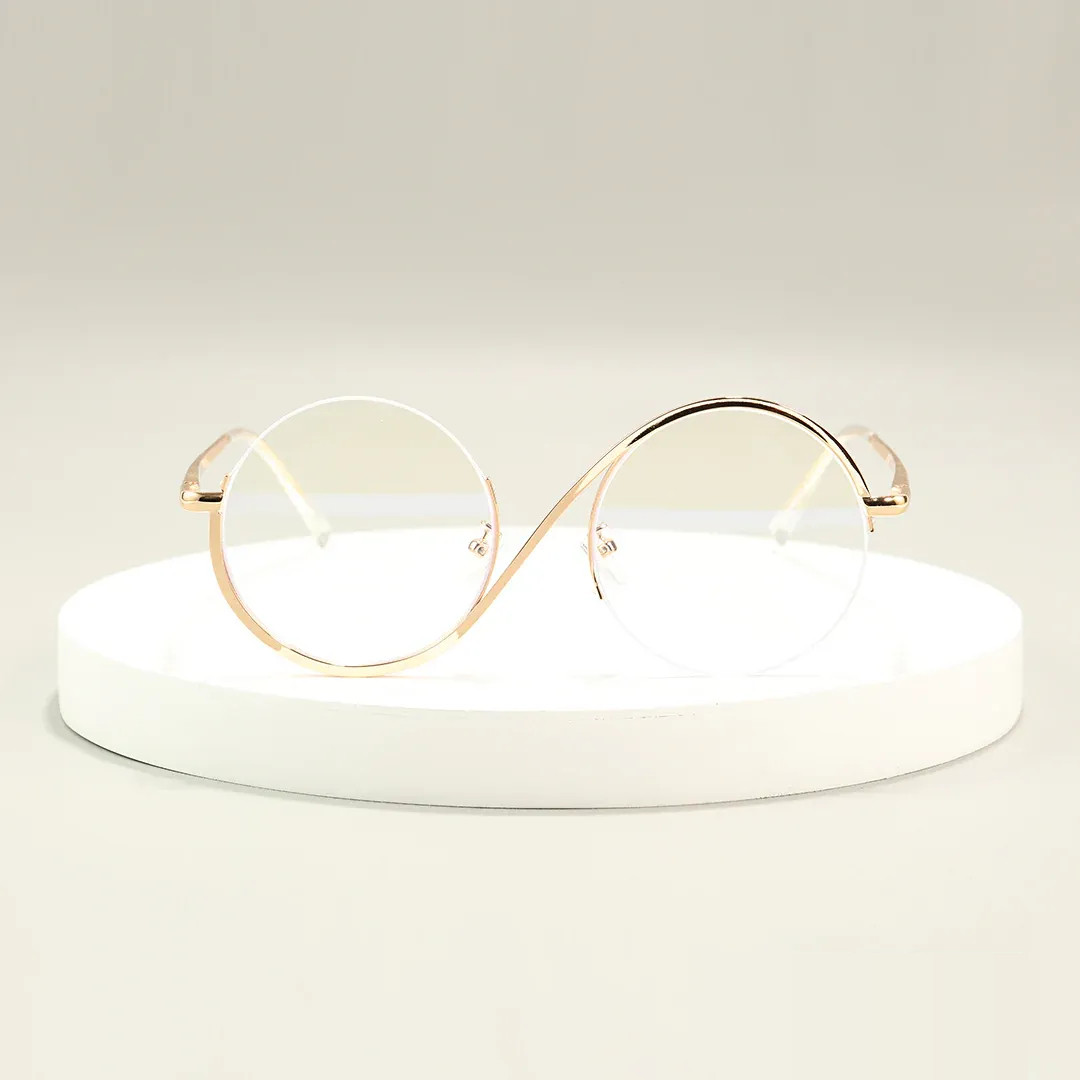 Scene view of Wicked round metal eyeglasses RM0332412 in gold