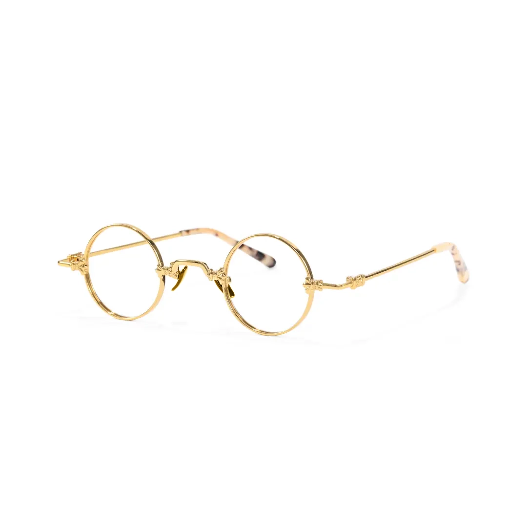 Angle view of Eddie round metal eyeglasses RM0352505 in gold