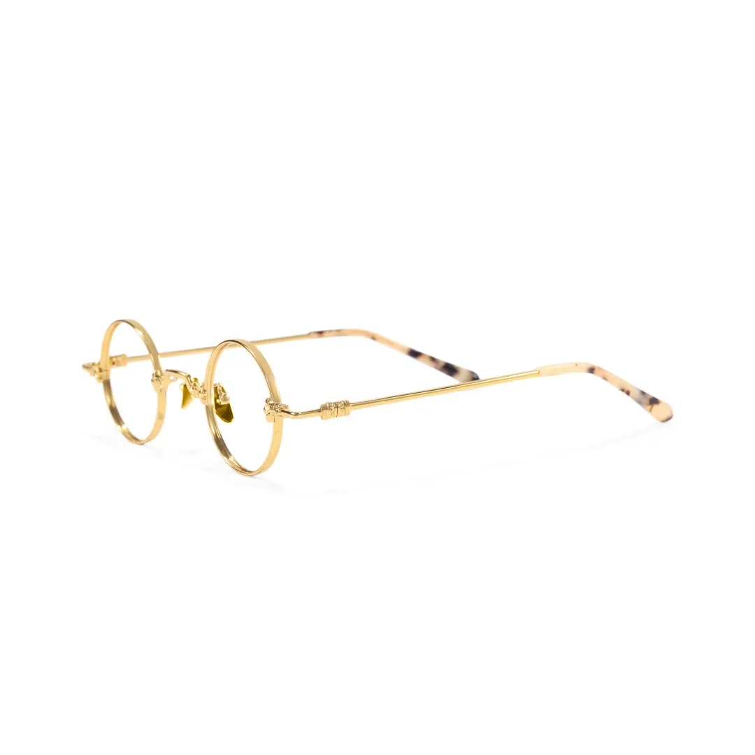 Side view of Eddie round metal eyeglasses RM0352505 in gold