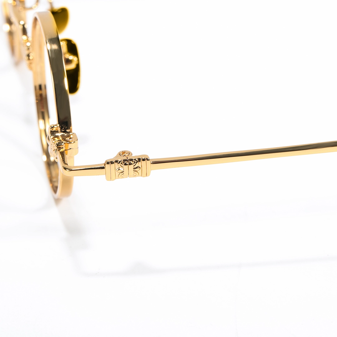 Temple detail of Eddie round metal eyeglasses RM0352505 in gold