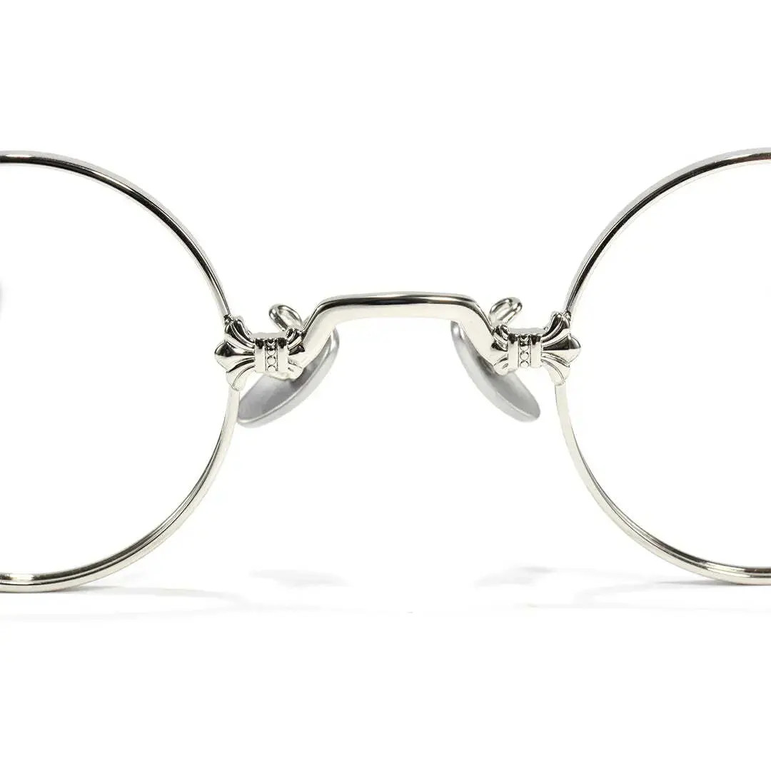 Adjustable nose pad detail of Eddie round metal eyeglasses RM0352505 in silver