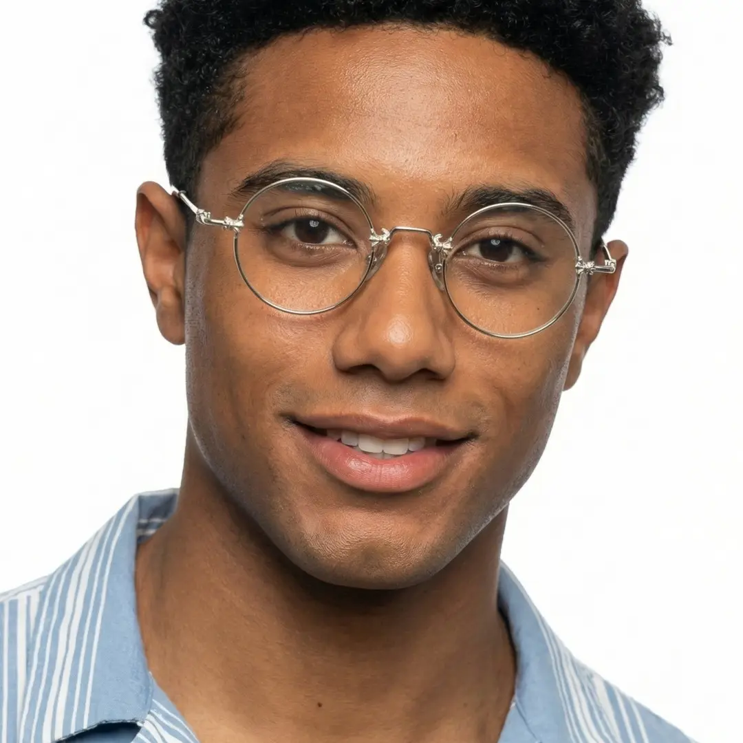 Front view of male wearing silver round eyeglasses, natural expression, RM0352505