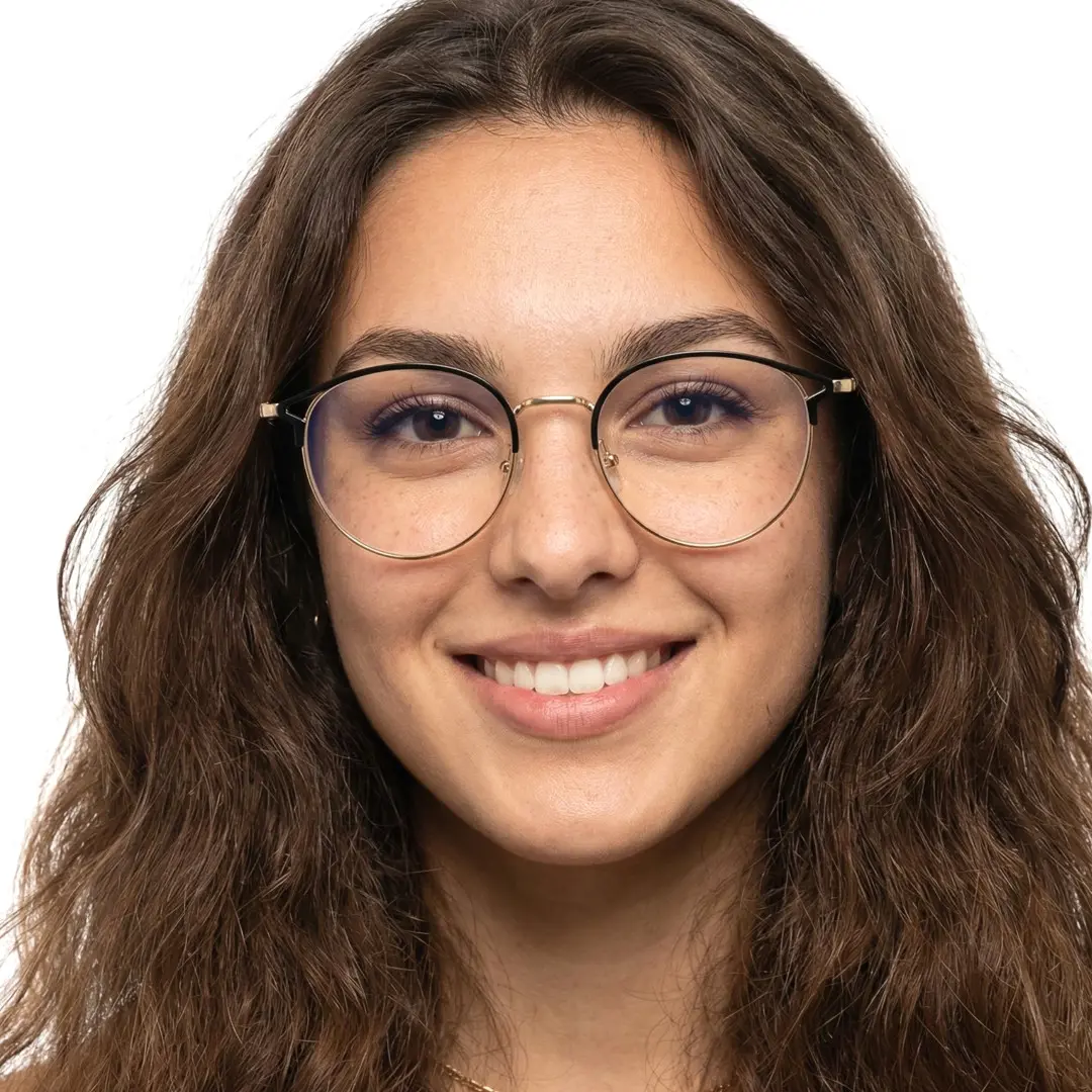 Front view of female wearing gold round eyeglasses, smiling, RM0462504