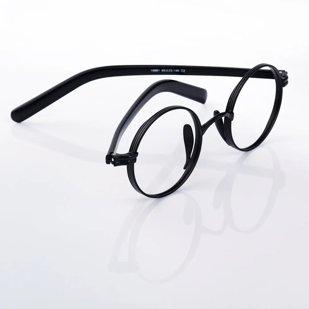 Scene close-up view of Sam vintage round metal eyeglasses RM0592302 in black