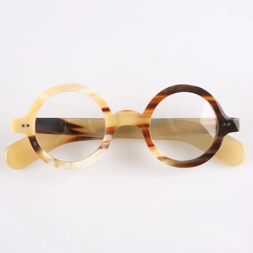 Front folded view of Cairn round natural ox horn handcrafted eyeglasses RO0262511 in yellow