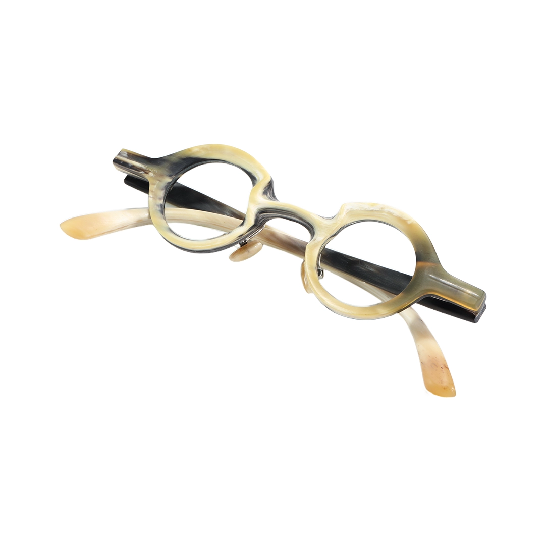 Front folded view of Kerno round natural ox horn handcrafted eyeglasses RO0312511 in white