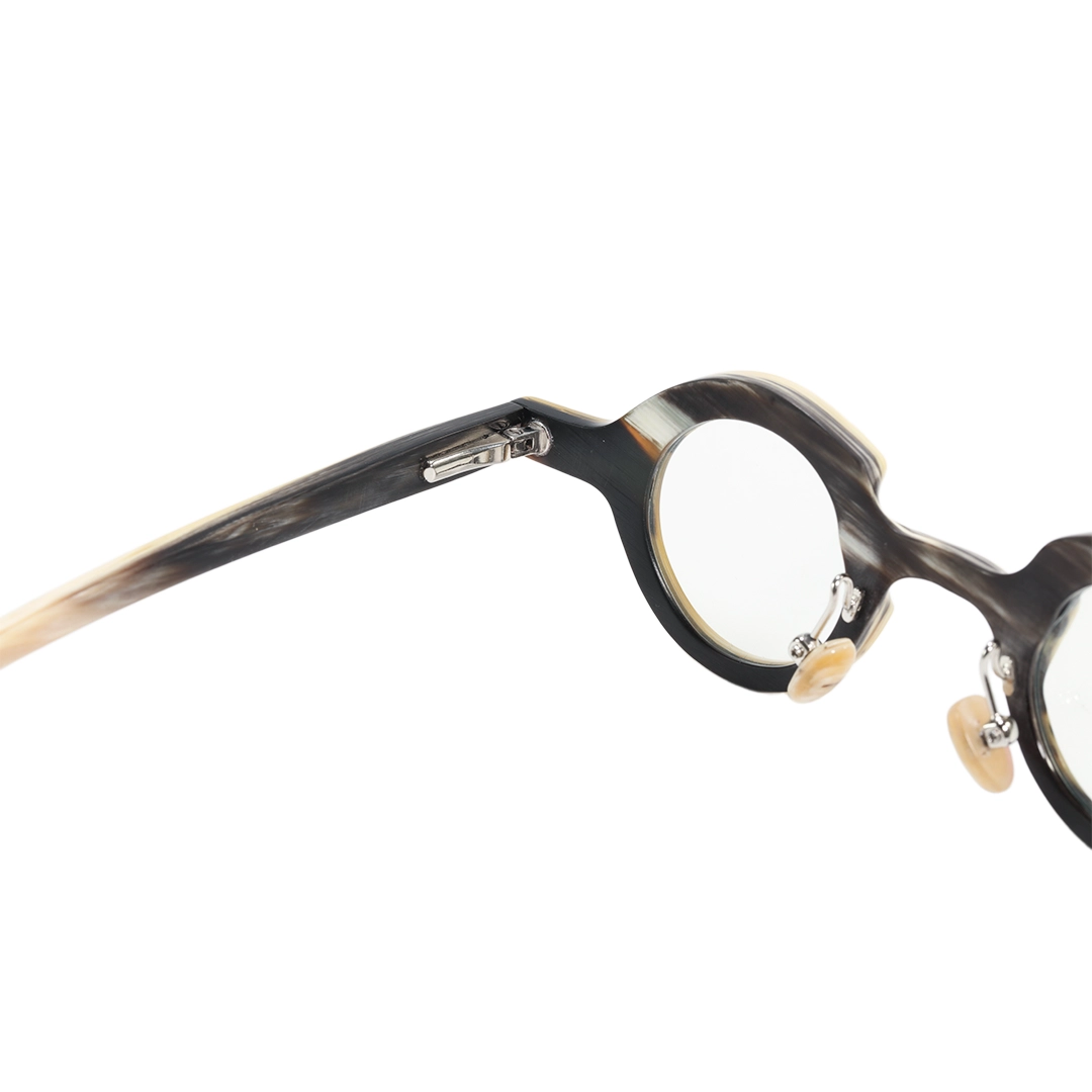 Spring hinge detail of Kerno round natural ox horn handcrafted eyeglasses RO0312511 in white