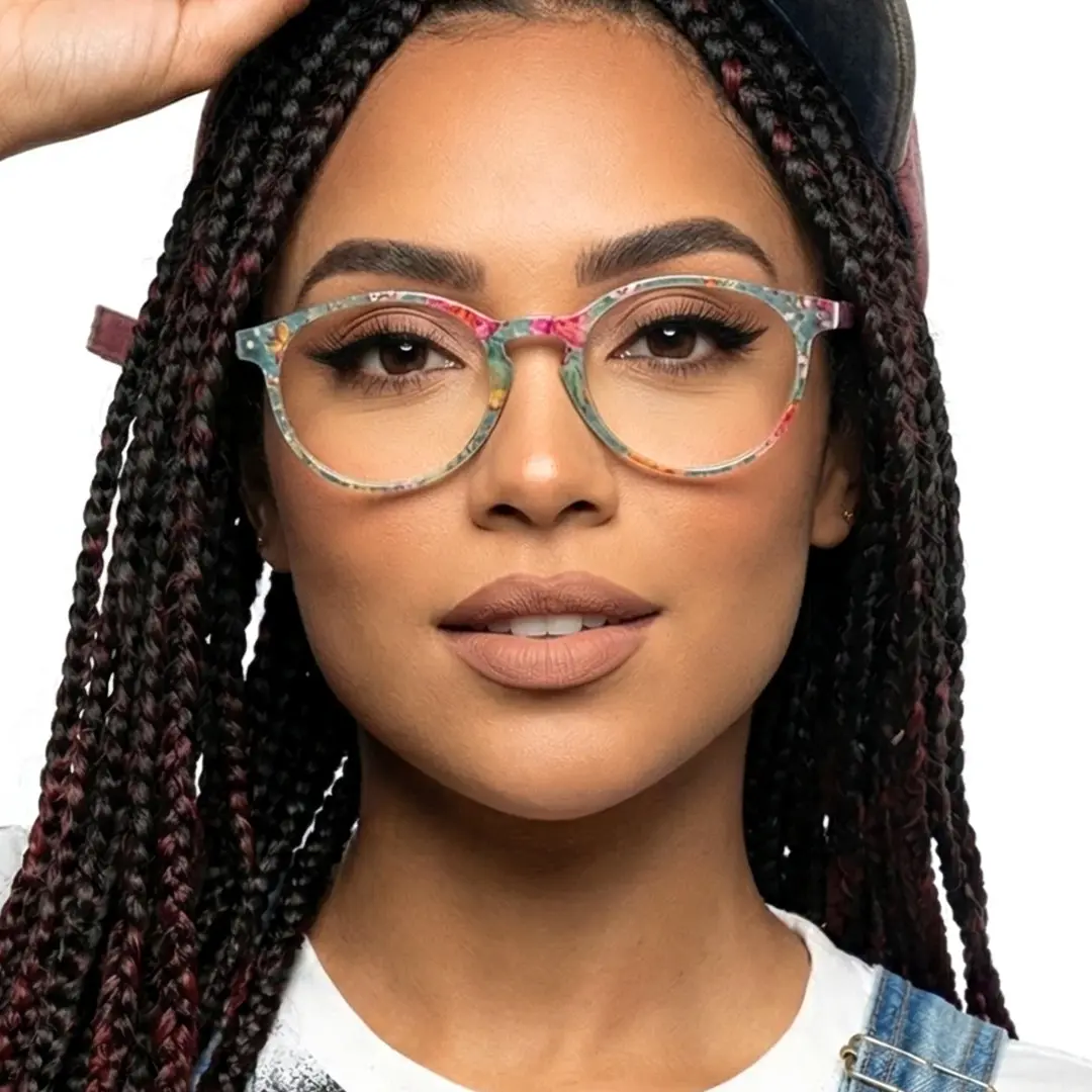 Front view of female wearing green round eyeglasses, natural smile, RP0032308