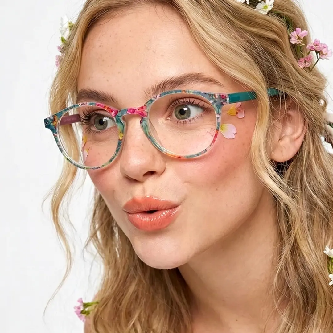 Looking away view of female wearing green round eyeglasses, pouting, RP0032308