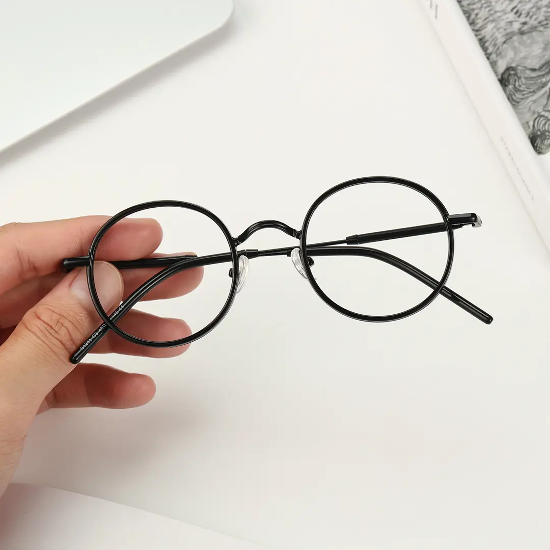 Scene view of Feye vintage round tr90 eyeglasses RR0032409 in black