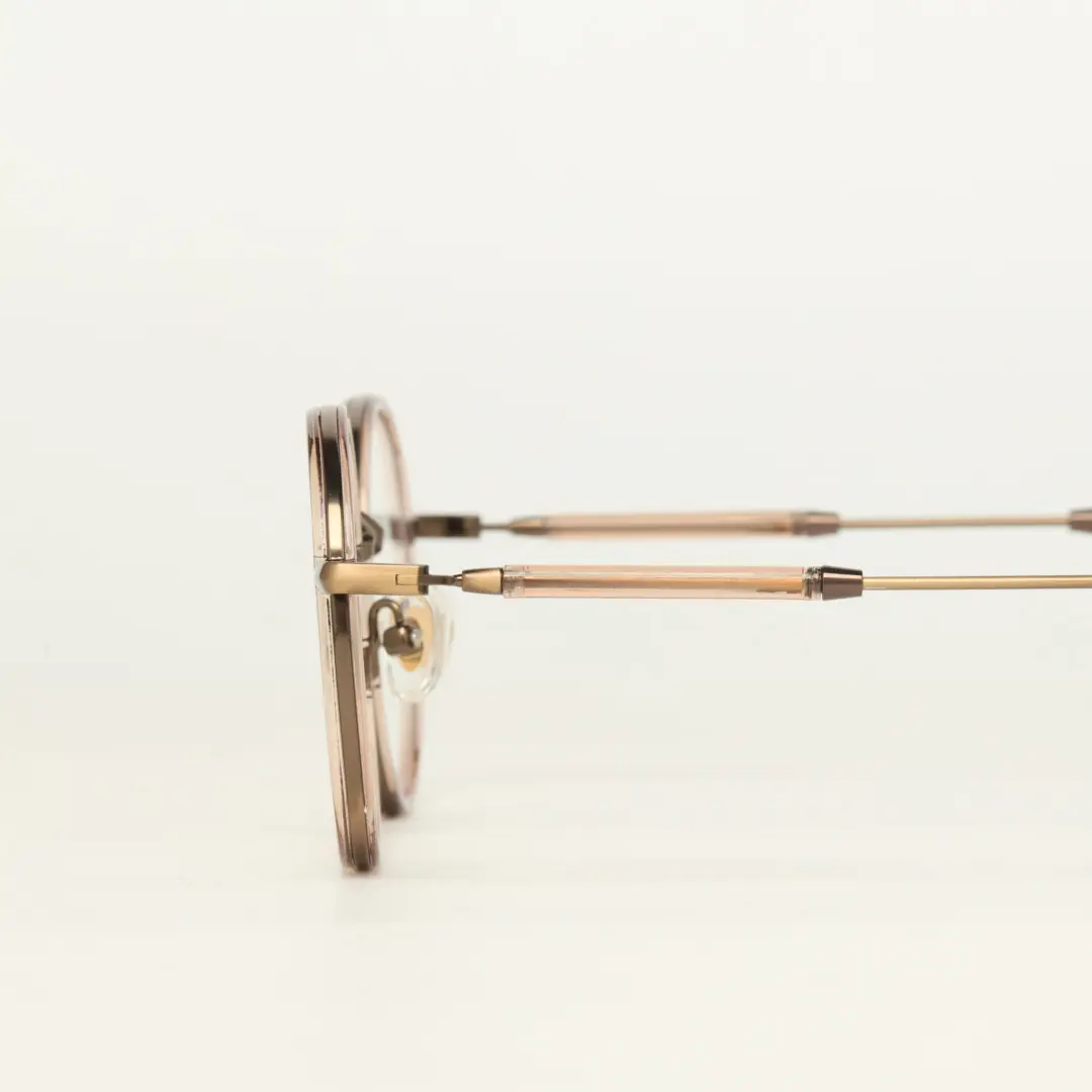 Scene close-up view of Feye vintage round tr90 eyeglasses RR0032409 in bronze