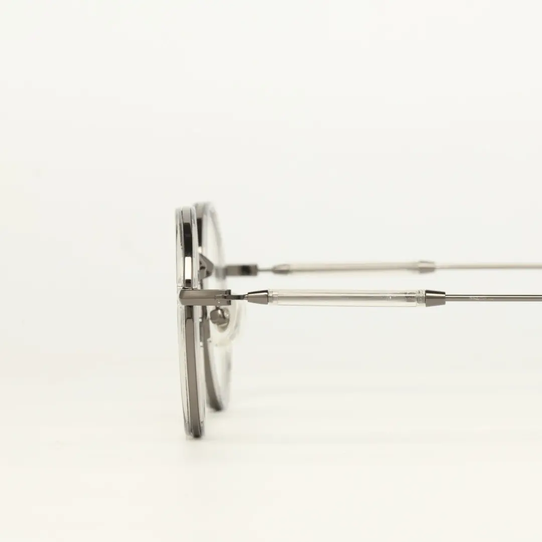 Scene close-up view of Feye vintage round tr90 eyeglasses RR0032409 in silver