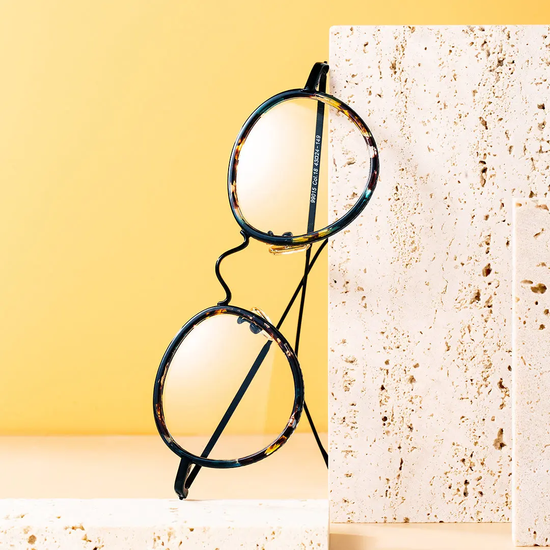 Scene close-up view of Miko vintage round tr90 eyeglasses in multicolor. SPU: RR0082308
